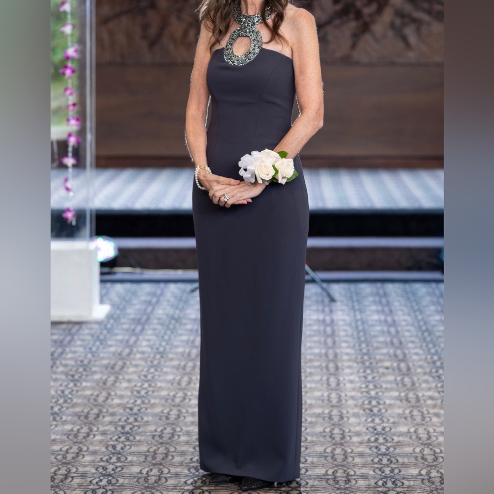 Designer Lucian Matis evening gown. Size 4. Color is charcoal grey.